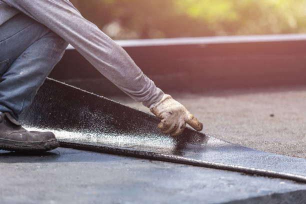 Professional Waterproofing technician working in Michigan City, IN